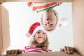 Surprised children unpack Christmas gift box - PhotoDune Item for Sale