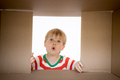 Surprised child unpack Christmas gift box - PhotoDune Item for Sale