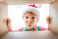Surprised child unpack Christmas gift box - PhotoDune Item for Sale