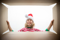 Surprised child unpack Christmas gift box - PhotoDune Item for Sale