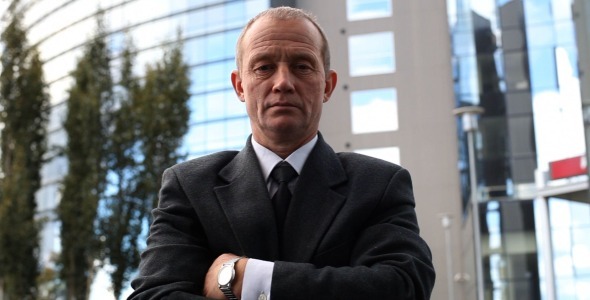 Confident Senior Businessman Outside Office