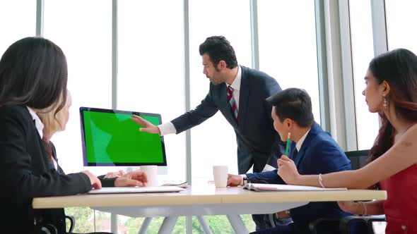 Business People in the Conference Room with Green Screen