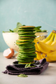Spinach pancakes stack on blue background, food and drink - PhotoDune Item for Sale