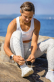Athletic Woman Wearing Shoes During Outdoor Workout - PhotoDune Item for Sale