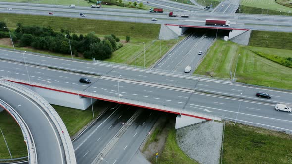 Video Filming From a Drone View of the Road Junction with Cars Moving Along It