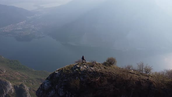 Hiker on top of the mountain, Lake Como, European Alps, Italy