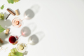 Wine composition with beautiful sunlight and shadows on white background. Top view, flat lay - PhotoDune Item for Sale