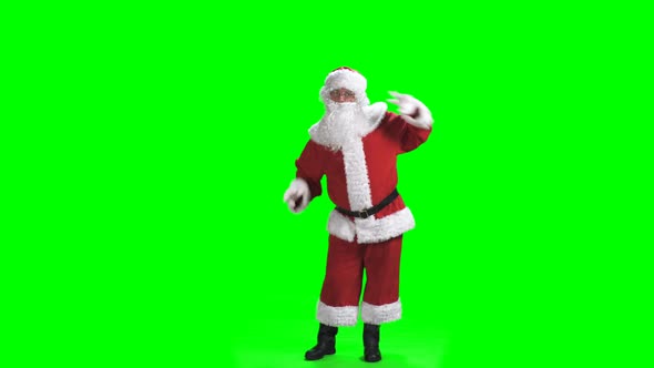 Merry Christmas. Dancing Santa Claus In Full Growth In Red Suit