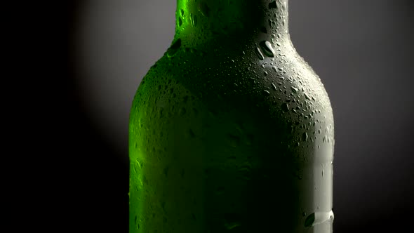 Cold Beer with Condensate. Classic Green Bottle