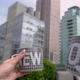 Couple Clink Cups with New York Against the Background of Manhattan Skyscrapers - VideoHive Item for Sale