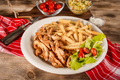 Greek gyros dish with fries and salad - PhotoDune Item for Sale