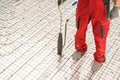 Worker Using Floor Radiant Heating Pipeline Foam Board Stapler - PhotoDune Item for Sale