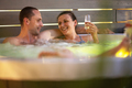 Couple Having Romantic Time in Their Garden Hot Tub Spa - PhotoDune Item for Sale