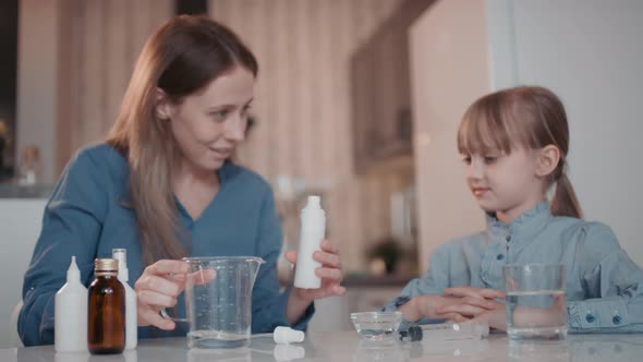 Applying Homemade Sanitizer On Hands