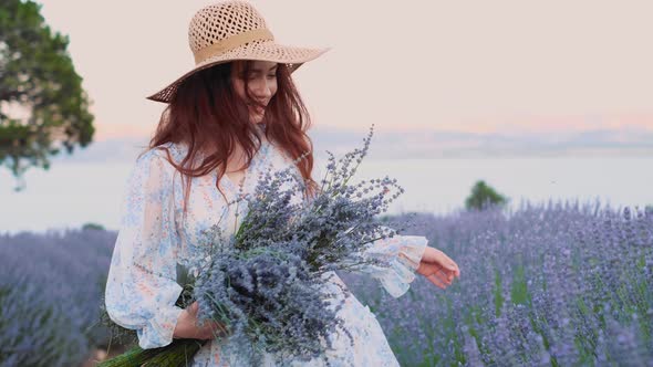 Woman in Lavender Flowers Field