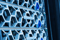 Closeup Of Modern Hard Drives In Illuminated Blue Datacenter - PhotoDune Item for Sale