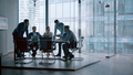 Young professionals having a discussion at a meeting in a modern office - PhotoDune Item for Sale