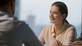 Mature corporate director woman asking questions to partners at business negotiations - PhotoDune Item for Sale
