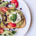 Poached eggs, avocado and cherry tomatoes on toast - PhotoDune Item for Sale