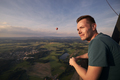Man enjoying view from hot air balloon - PhotoDune Item for Sale