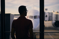 Silhouette of man while waiting for flight - PhotoDune Item for Sale