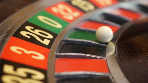 Ball on Roulette Table in Casino