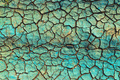 Blue chemical liquid dried over dry cracked land - PhotoDune Item for Sale
