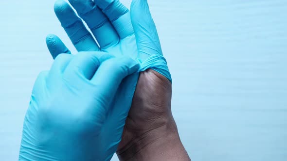 Man Doctor Wears Medical Gloves, Close Up