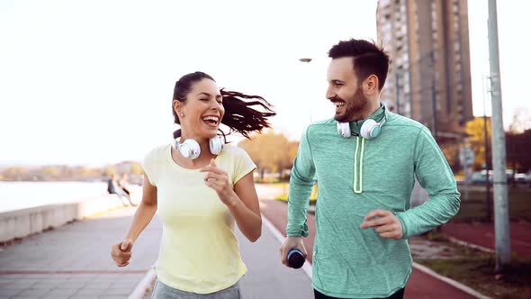 Beautiful Couple Jogging and Fitness Training Outdoor