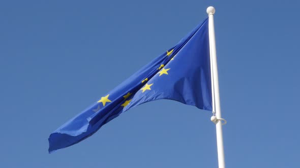 Slow motion European Union recognizable flag waving in front of blue sky 1920X1080 HD footage - Flag