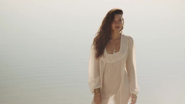 Woman Resting on the Beach During Vacation