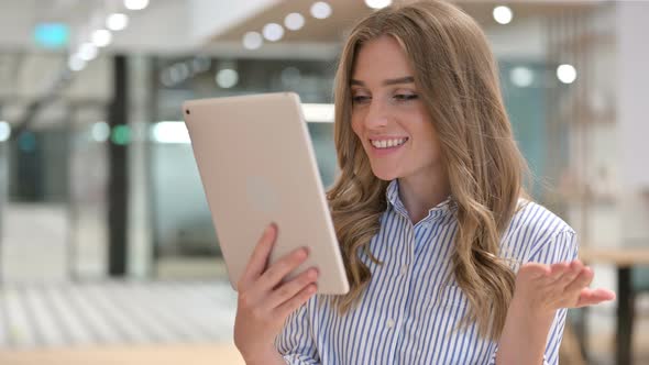 Portrait of Businesswoman Doing Video Call on Digital Tablet 