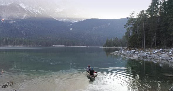 Aerial of two friends in canoe, Bavaria, Germany