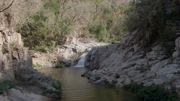 Approaching On Yelapa Small Waterfall On Tropical Forest In Jalisco, Mexico. Aerial Dolly Shot