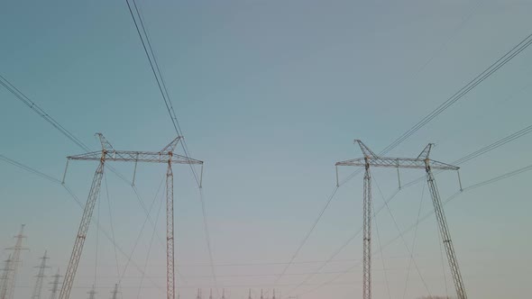 Power Pylons in a Field in Winter