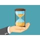 Businessman Hand Holding Hourglass - GraphicRiver Item for Sale
