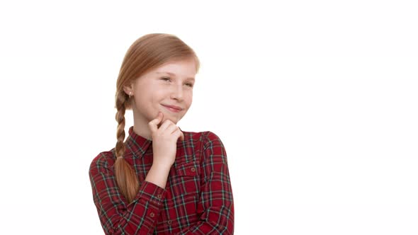 Young Confident Caucasian Teenager Girl Standing on White Background with Folded Hands and Smiling