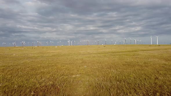 Bird'seye View of Wind Turbines Generating Green Electricity in a Steppe Area