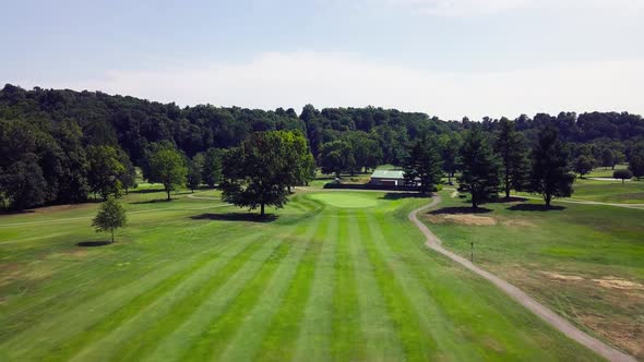 Aerial View of Drone Flying Over Fairway To Green 