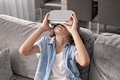 close up happy little boy child using virtual reality headset vr glasses gesturing at home fun - PhotoDune Item for Sale