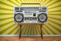 Retro ghetto blaster boombox, radio and audio tape recorder on vintage background. - PhotoDune Item for Sale