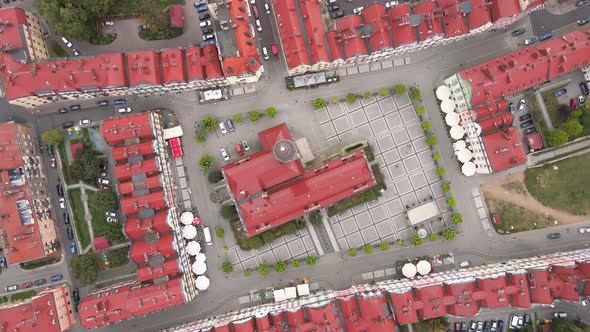 Aerial top down view of the market square and the tow hall in Bolesławiec on a cloudy day. Bolesławi