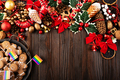Christmas background of tray with gingerbread cookie men and rainbow flags on wooden table - PhotoDune Item for Sale