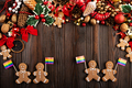 Christmas background of gingerbread cookie men with rainbow flags on wooden table - PhotoDune Item for Sale