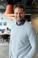 Portrait of smiling caucasian mid adult businessman at creative office - PhotoDune Item for Sale