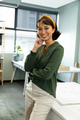 Portrait of smiling asian young female architect in office - PhotoDune Item for Sale
