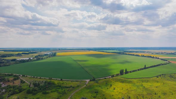  Beautiful Green Field with Shadows From Moving Clouds 