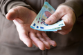White man shows Euro money twenty bills closeup in his hands - PhotoDune Item for Sale