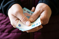 Euro money twenty bills closeup in white man hands - PhotoDune Item for Sale