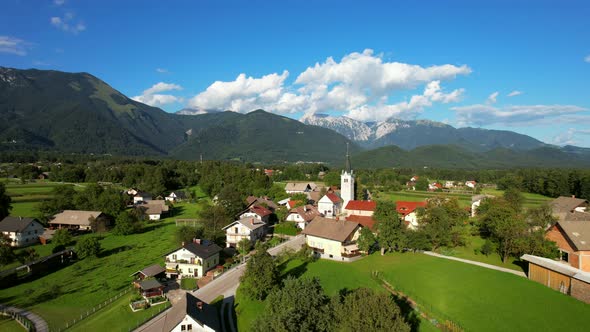 This is a random and beautiful village filmed in the countryside of Slovenia. In the background, a s